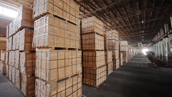 huge storage boxes stacked up in a warehouse
